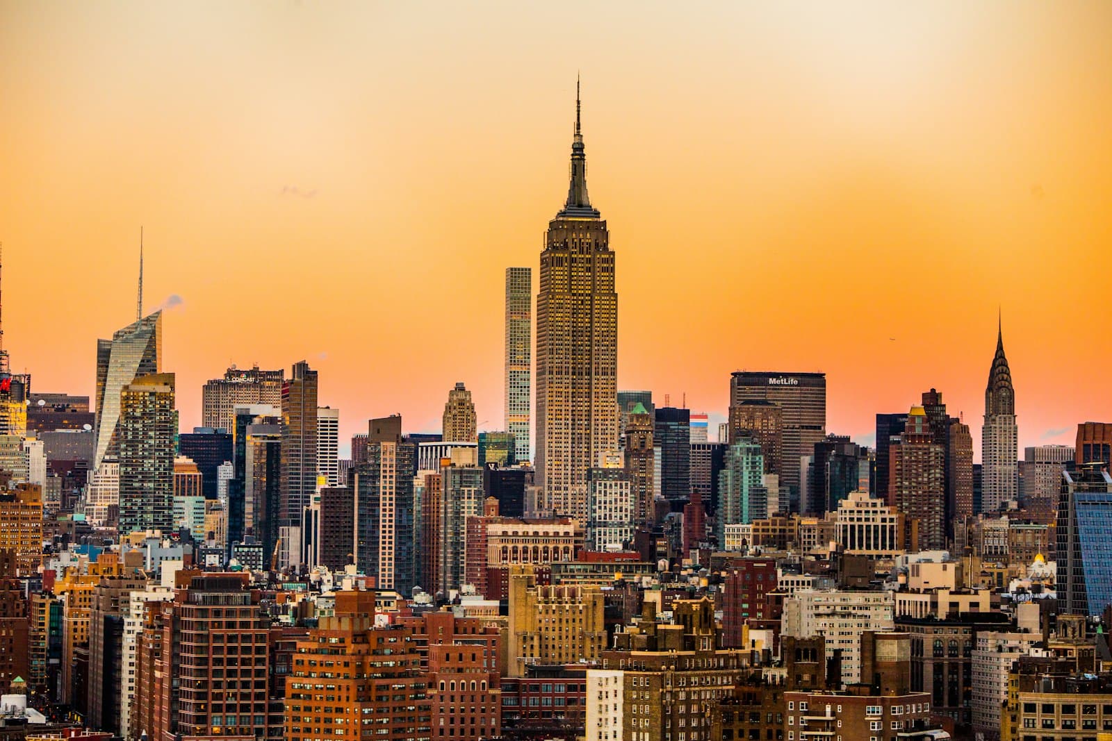 New York skyline in orange evening light, including the Empire State Building